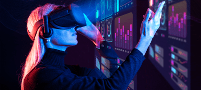 Professional Using Virtual Reality Tools to Explore Predictive Analytics Dashboards, Showcasing Ailit's Certificate in Business Analytics and Predictive Modeling.
